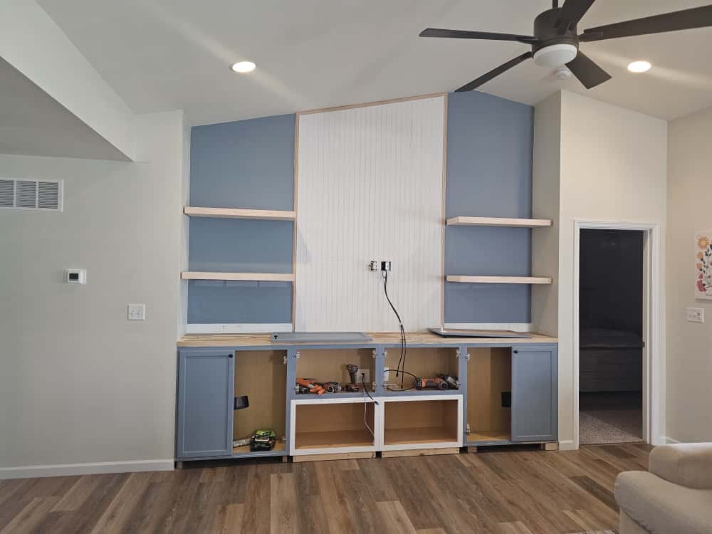 Process — custom cabinetry and beadboard installation underway